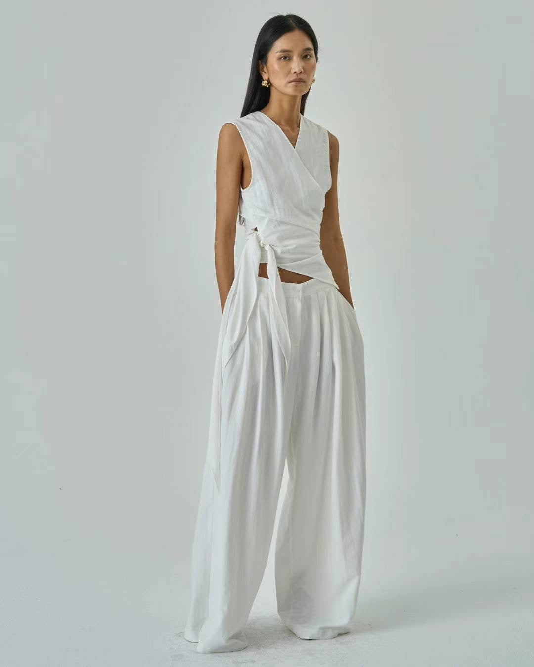 Remi White Pleated Trousers